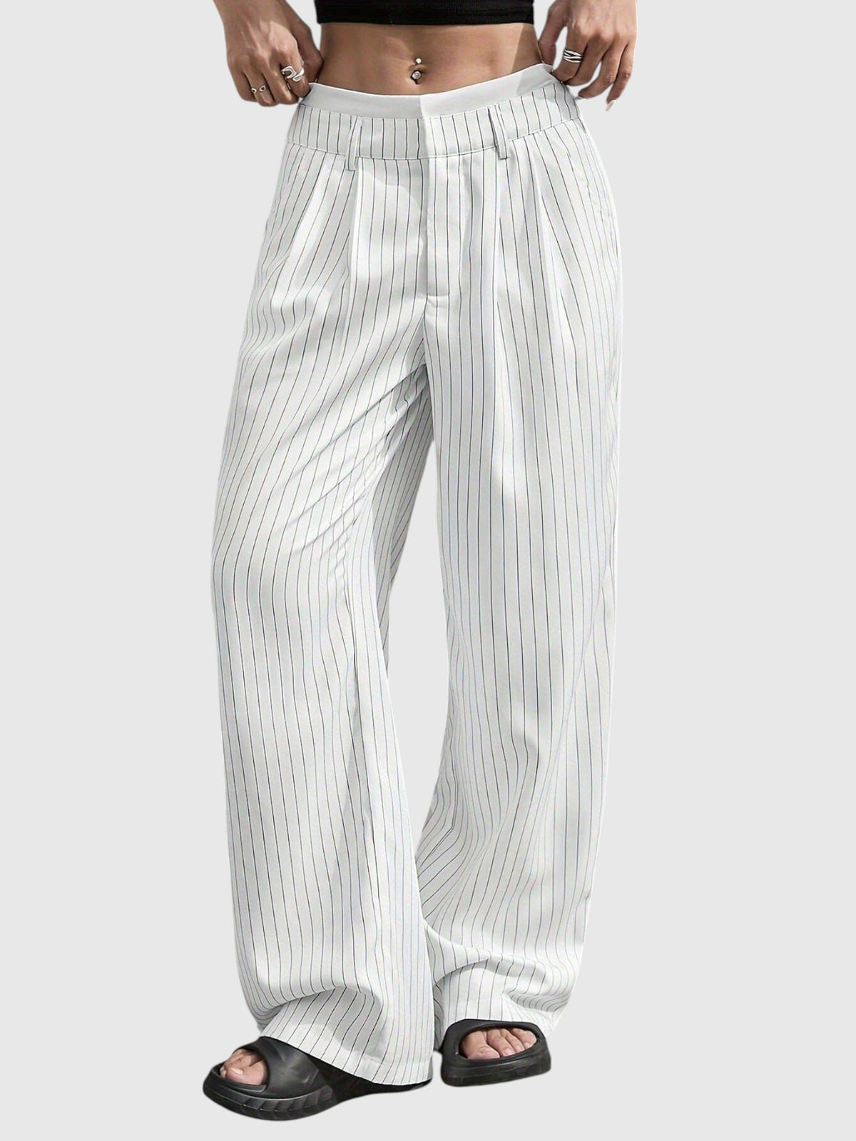 My Store Abigail high waisted wide leg pinstripe pants in white with an elastic waistband worn by a model