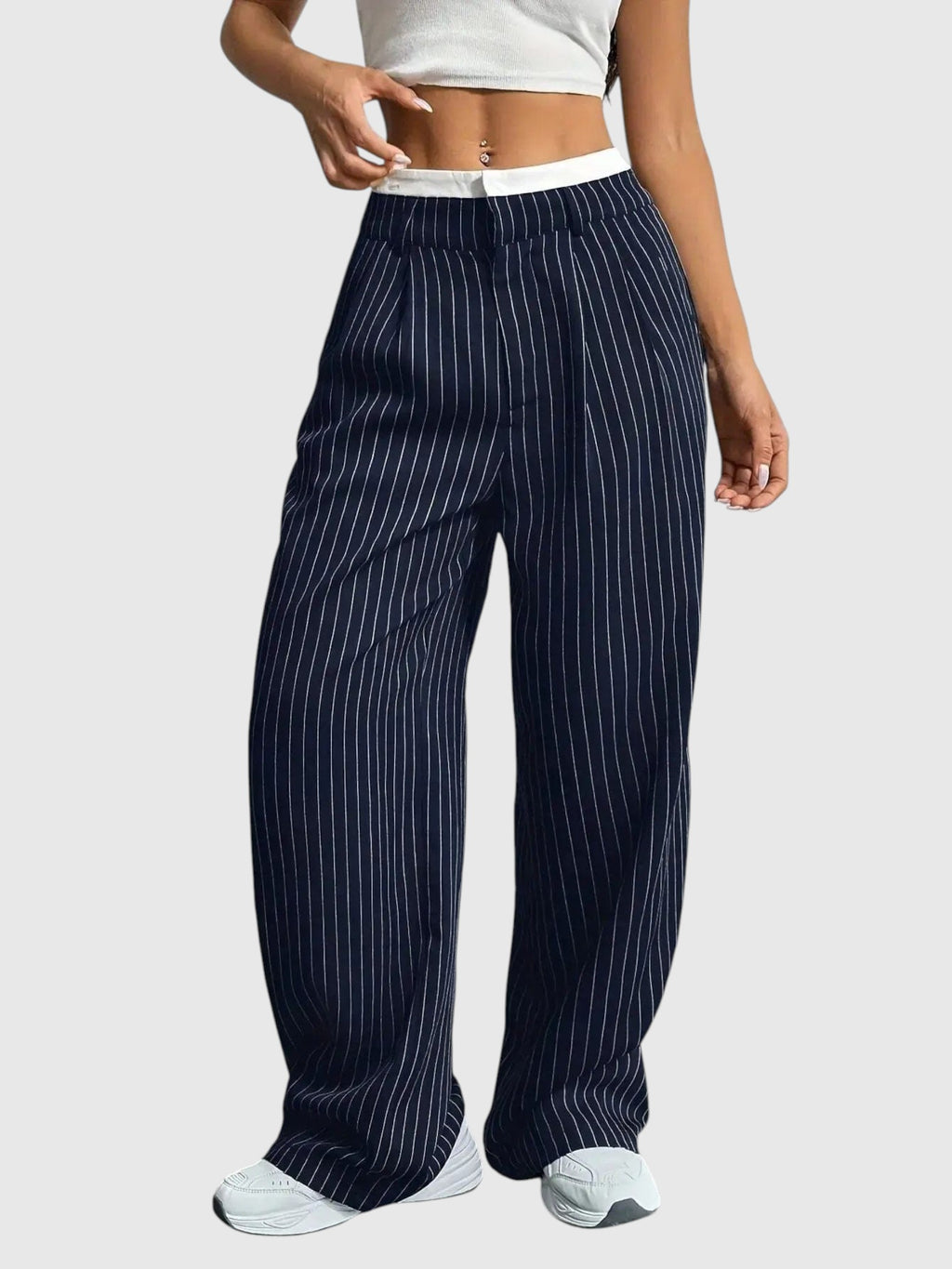 My Store Abigail high waisted wide leg pinstripe pants in navy blue with an elastic waistband on a model