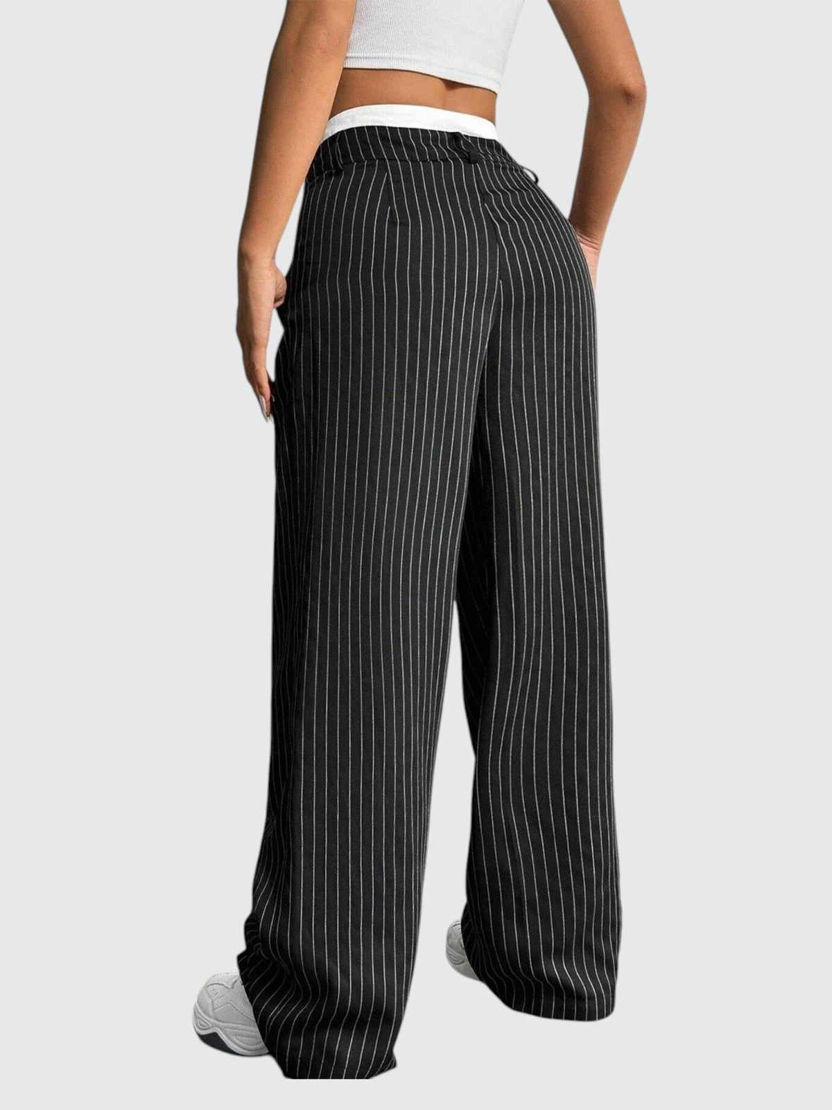 My Store Abigail high waisted wide leg pinstripe pants in black with elastic waistband, back view on a model