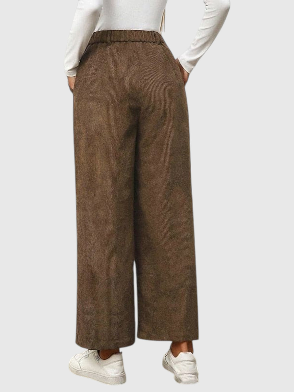 My Store Bianca brown corduroy wide-leg pants with a high waist, shown from the back with white sneakers