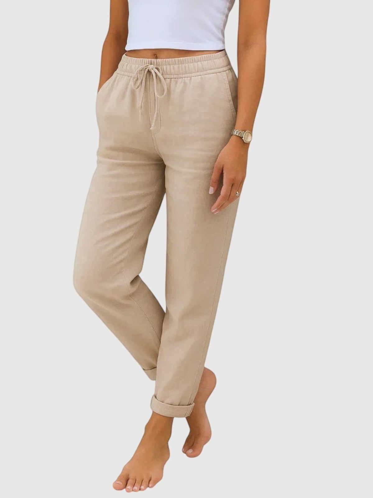 My Store Luna beige drawstring pants with elastic waist and relaxed tapered fit on a model
