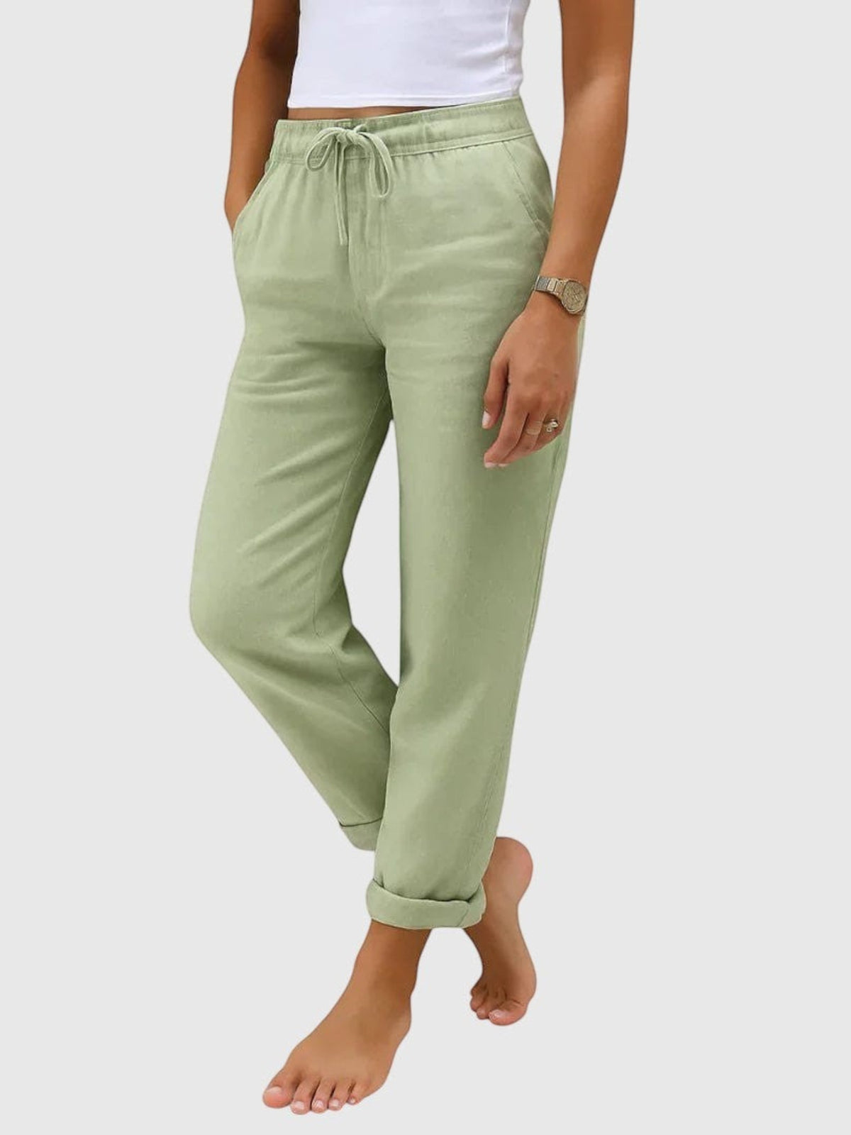 My Store Luna sage green drawstring pants with elastic waist and relaxed tapered fit on a model