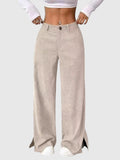 My Store Peyton high-waisted wide-leg pants in beige with a button front and side hem slits on a model